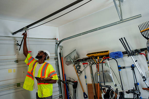 Professional Garage Door Panel Replacement technician working in Gloversville, NY
